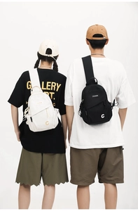 Detail of adjustable straps on black and white nylon crossbody chest bags for travel