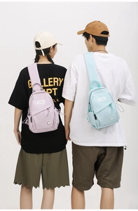 Detailed back view of casual nylon crossbody chest bags in light purple and blue colors