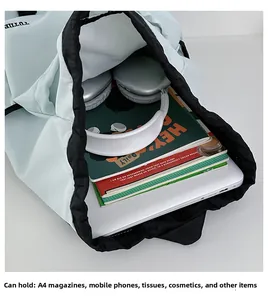 Internal storage detail showing large capacity for A4 magazines and daily essentials