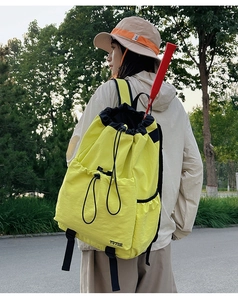 Bright yellow lightweight waterproof drawstring backpack for outdoor hiking and sports