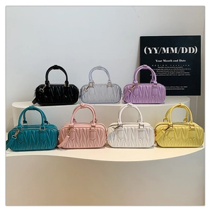Collection of jelly Boston bags featuring V-shaped quilted stitching in seven colors