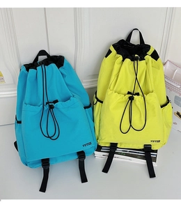 Sky blue and bright yellow nylon drawstring backpacks featuring multi-pocket storage