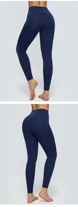 Detailed back and side view of high-waisted navy yoga leggings with lifting seams