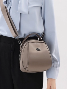 Fashionable shell-shaped crossbody bag in khaki nylon with adjustable wide strap and MS logo