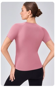 Back view of slim fit yoga t-shirt in dusty pink with breathable quick dry fabric