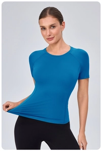 Close-up of blue yoga t-shirt showing high-stretch quick-dry fabric and raglan sleeves