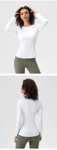 Close-up of the breathable high-stretch fabric and ergonomic fit of the white yoga top