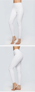 Detail of high-waisted white yoga leggings featuring wide waistband and smooth fabric