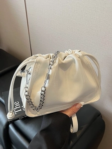 Chic white cloud pleated bucket bag with silver chain strap and drawstring closure