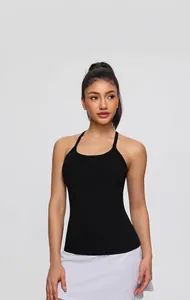 Close-up of black breathable yoga tank top with thin straps and u-neckline design