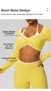 Détail du haut court de yoga jaune avec liseré blanc, fronces et ourlet en forme de V
