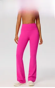 Full length view of high-waisted hot pink flared yoga pants with slimming compression