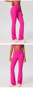 Detailed front and side view of hot pink high waisted flared yoga pants in a studio set