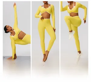 Vues détaillées du haut de yoga jaune à manches longues et du legging avec liseré blanc