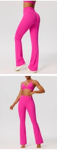 Detail view of high-waist flared yoga pants in rose pink with scrunch butt lift feature