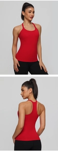 Detail view of red ribbed yoga tank top with racerback design and built-in chest pads