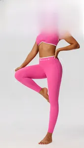 Detail of high-waist rose pink yoga pants with elastic fabric and 3D shaping seam details