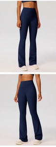 Detail view of high waisted navy blue flare yoga pants with tummy control and butt lift