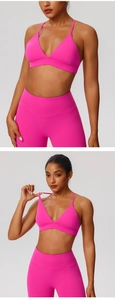 Detail of hot pink V-neck sports bra and high-waist yoga leggings set with matte finish