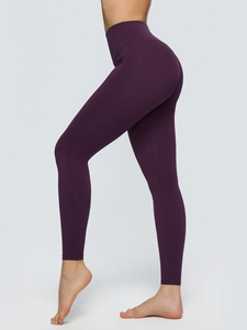 Dark purple high-waisted yoga leggings with seamless matte finish for gym and fitness