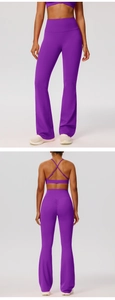 Detail view of purple high waist flared yoga pants and cross back sports bra set