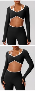 Détail du haut de yoga contrasté noir et blanc à manches longues avec soutien-gorge