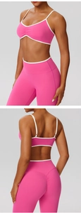 Detail of hot pink yoga set featuring ruched sports bra and high-waisted lifting leggings