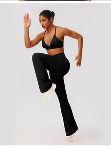 Detailed close-up of high-elasticity breathable yoga set fabric with flared leggings
