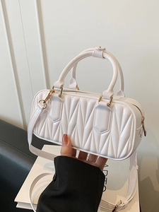 White geometric quilted Boston handbag with gold hardware and shoulder strap for women
