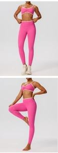 Detail view of pink yoga set with white trim showing flexible fabric and ruched sports bra