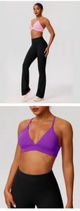 Close-up of pink sports bra with cross back design and high-waist yoga pants
