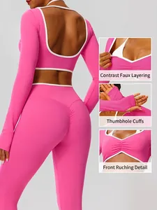 Ensemble de yoga rose à manches longues contrastées avec passe-pouces et haut plissé