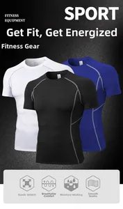 Flat lay of athletic compression shirts showing seams in black, white, and blue colors