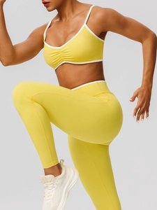 Lemon yellow yoga set with strappy sports bra and high waisted leggings with white trim