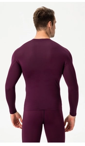 Rear view of men's deep purple compression sports suit showing ergonomic fit and fabric