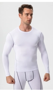 Flatlock seams detail on men's white compression long sleeve and leggings set