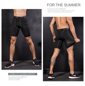 Detail view of men's black compression shorts with professional four-needle six-line stitching