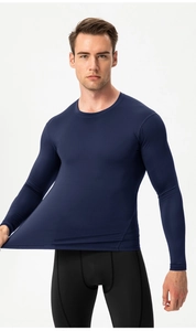 Detail of navy blue compression shirt showing high elastic fabric stretch and texture