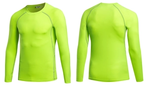 Detailed view of neon green compression shirt with flatlock seams and raglan sleeves