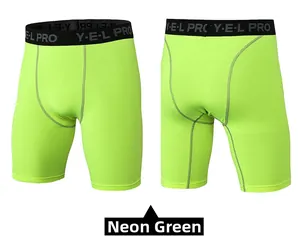 Front and back view of fluorescent green compression shorts with elastic waistband