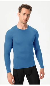 Detail showing bright blue men's compression shirt with high-elastic quick-dry fabric fit
