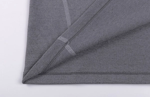 Detail of gray heather knit fabric with premium double-needle stitching and texture