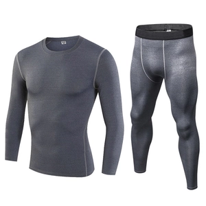 Dunkelgrauer Kompressionsanzug für Herren mit elastischem Langarmshirt und Hose