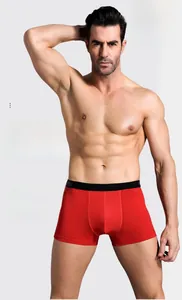 Men's red cooling athletic boxer shorts with wide elastic waistband and breathable fabric