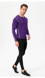 Front full-body view of men's purple compression top and black athletic leggings set