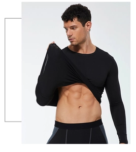 Detail showing the high elasticity and stretch recovery of the men's dry-fit sports shirt