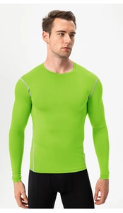 Detailed view of neon green compression shirt featuring reinforced silver flatlock stitching