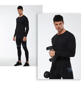 Detail of men's compression long sleeve shirt and leggings with grey stitching