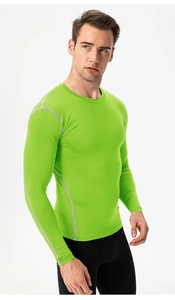 Detail of lime green compression shirt showing flatlock seams and athletic fit fabric
