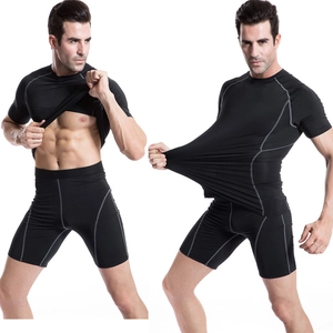 Men's black compression gym set including breathable short sleeve top and athletic shorts